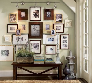 family-photo-wall-collage-arrangements-design-in-the-corner-entryway-house-decor-with-wooden-frame-and-white-interior-color-plus-table-with-indoor-plants-and-bookshelf-ideas