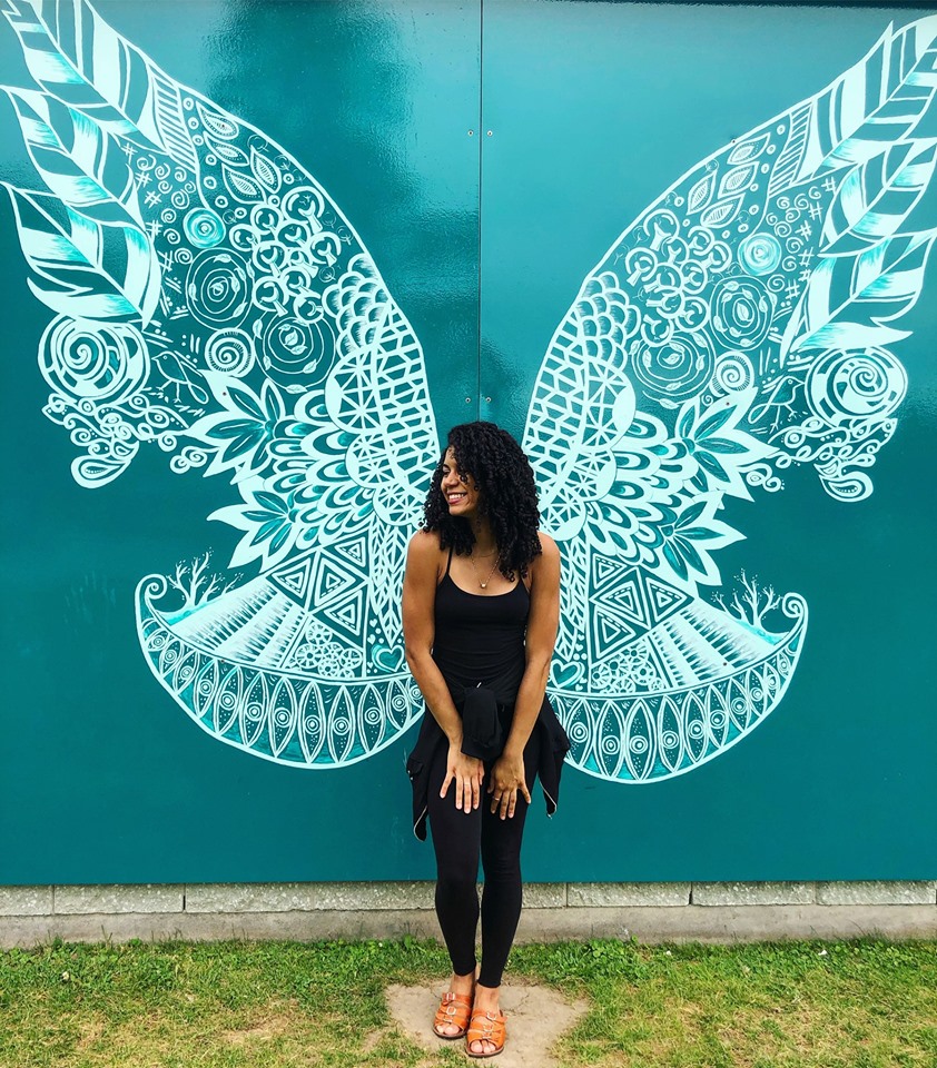 happy girl with wings to fly 