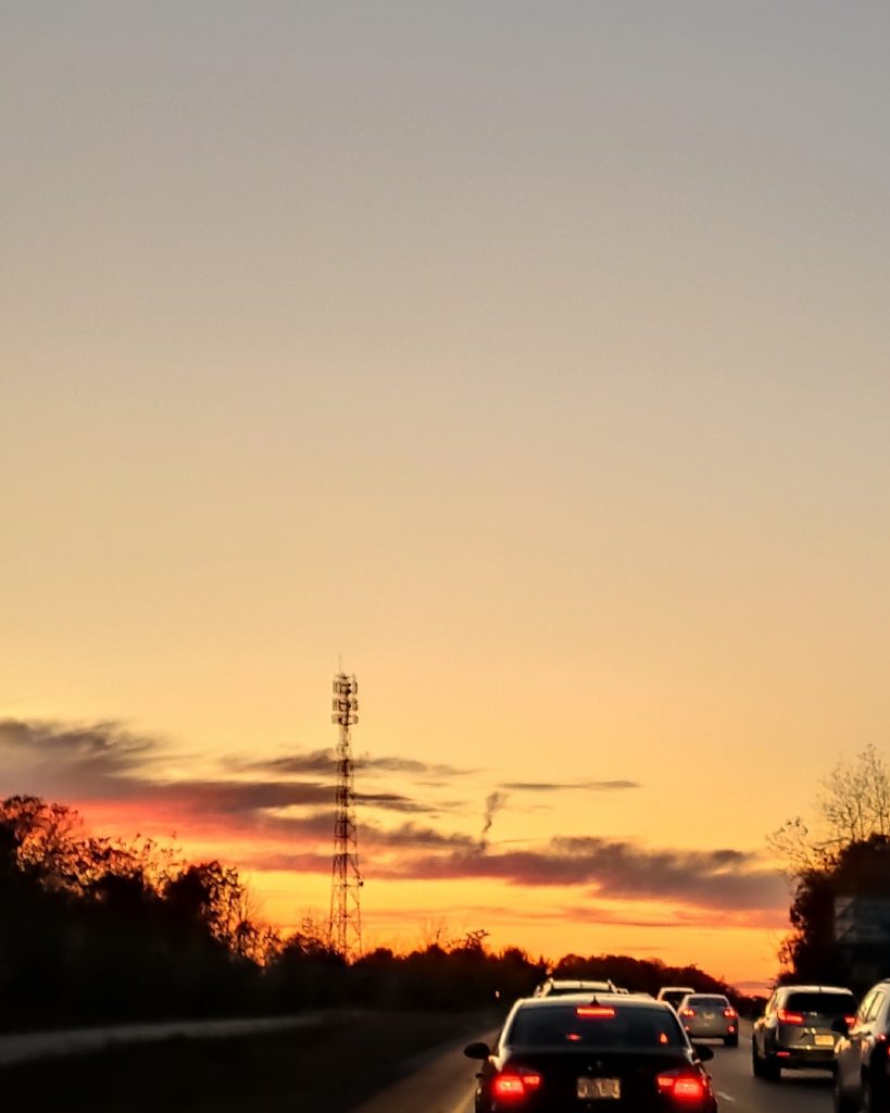 coucher de soleil autoroute auto