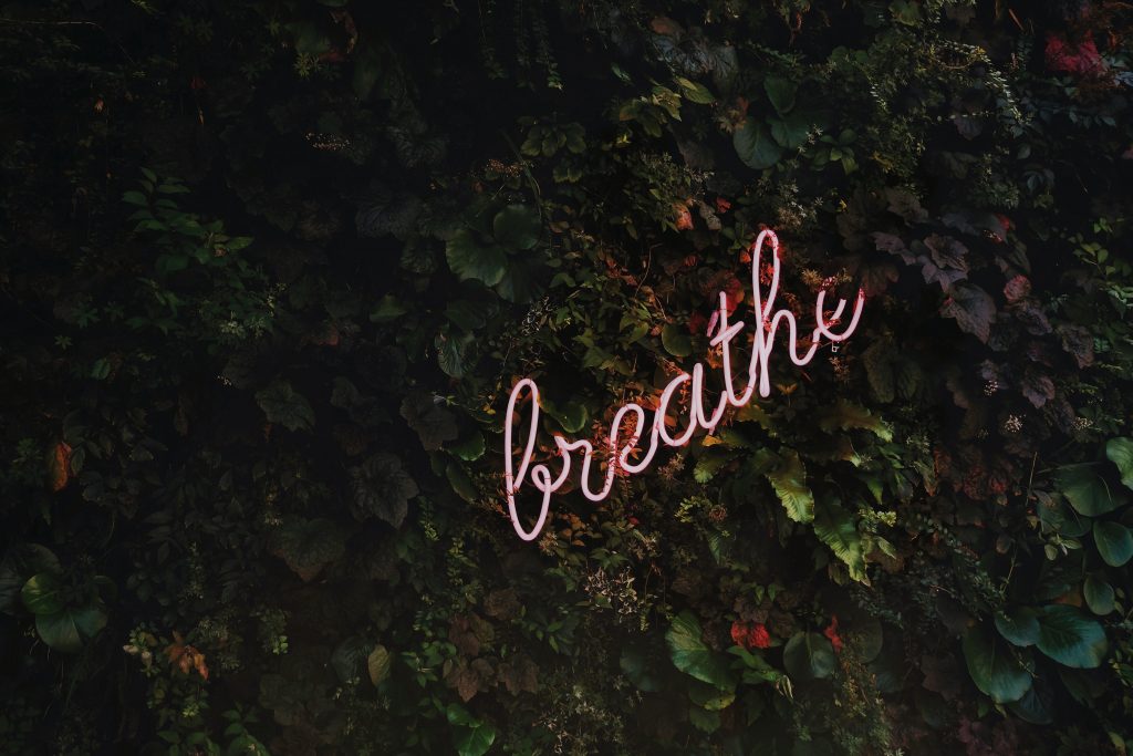 breathe neon sign rouge